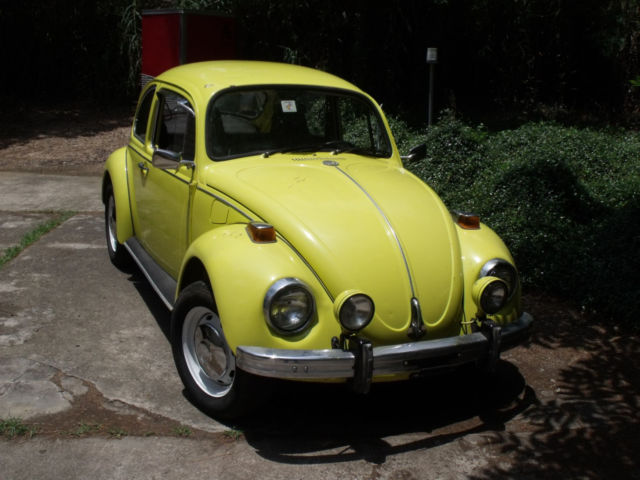 1970 saturn yellow vw beetle