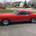 1965 Red Ford Mustang thumbnail