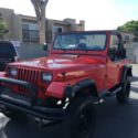 1989 Red Jeep Wrangler thumbnail