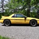 1988 Yellow Pontiac Fiero thumbnail