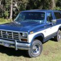 1986 Blue and White Ford Bronco thumbnail