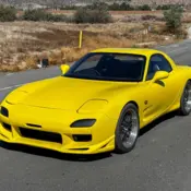 1900 Yellow Mazda RX-7 thumbnail