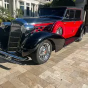 1934 Red Cadillac All Weather Phaeton thumbnail