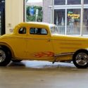 1934 Yellow Ford Coupe thumbnail