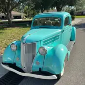 1936 Teal Ford Modle 68, 5 window coupe thumbnail