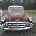 1953 Red Ford Mustang thumbnail