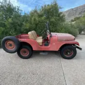 1955 Red Jeep CJ thumbnail