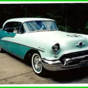 1955 Green Oldsmobile Holiday thumbnail