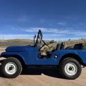 1956 Blue Jeep CJ thumbnail