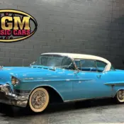1957 Blue Cadillac DeVille thumbnail