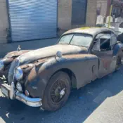 1957 Black Jaguar XK thumbnail