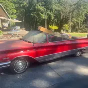 1960 Red Buick Electra thumbnail