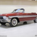 1961 Red Oldsmobile Starfire thumbnail