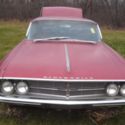 1962 burgundy Oldsmobile Starfire thumbnail