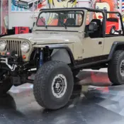 1963 Tan Jeep CJ thumbnail