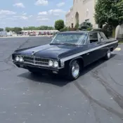 1963 Black Oldsmobile Starfire thumbnail