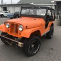1964 Orange Jeep CJ thumbnail