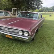 1964 Red Oldsmobile 98 thumbnail