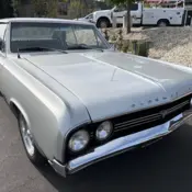 1964 Silver Oldsmobile Cutlass thumbnail