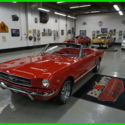 1965 Red Ford Mustang thumbnail