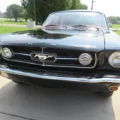 1965 black Ford Mustang thumbnail