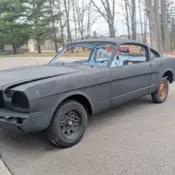 1965 Black Ford Mustang thumbnail