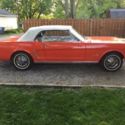 1965 Orange Ford Mustang thumbnail