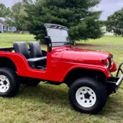 1965 Red Jeep CJ thumbnail