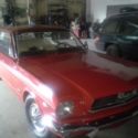 1965 Red Ford Mustang thumbnail