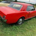 1965 Red Ford Mustang thumbnail