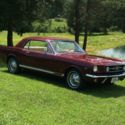 1965 Burgundy Ford Mustang thumbnail