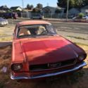 1965 Red Ford Mustang thumbnail