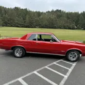 1965 Red Pontiac Le Mans thumbnail