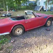 1965 Red Triumph TR 4 thumbnail