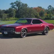 1966 Maroon Metallic Buick Riviera thumbnail