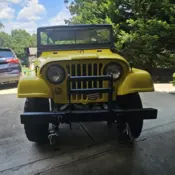 1966 Yellow Jeep CJ thumbnail