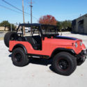 1966 Salmon Jeep Willys thumbnail