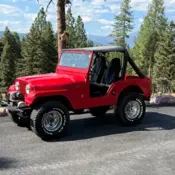 1967 Red Jeep CJ thumbnail