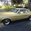 1968 flat gold Ford Mustang thumbnail