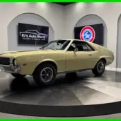 1969 Gold AMC AMX thumbnail