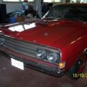 1969 candy apple red Ford Torino thumbnail
