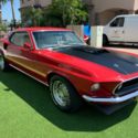 1969 Candy Apple Red Ford Mustang thumbnail