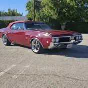 1969 Red Oldsmobile Custom thumbnail
