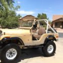 1971 Tan Jeep CJ thumbnail