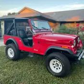 1973 Red Jeep CJ thumbnail