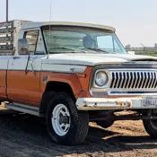 1973 Orange and White Jeep J4000 thumbnail