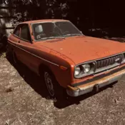 1975 Orange Datsun 710 thumbnail