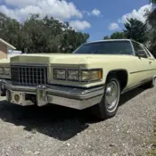 1976 Yellow Cadillac DeVille thumbnail