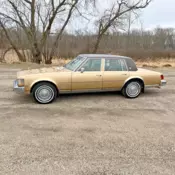 1976 Gold Cadillac Seville thumbnail