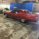 1976 FIRETHORN RED Cadillac DeVille thumbnail